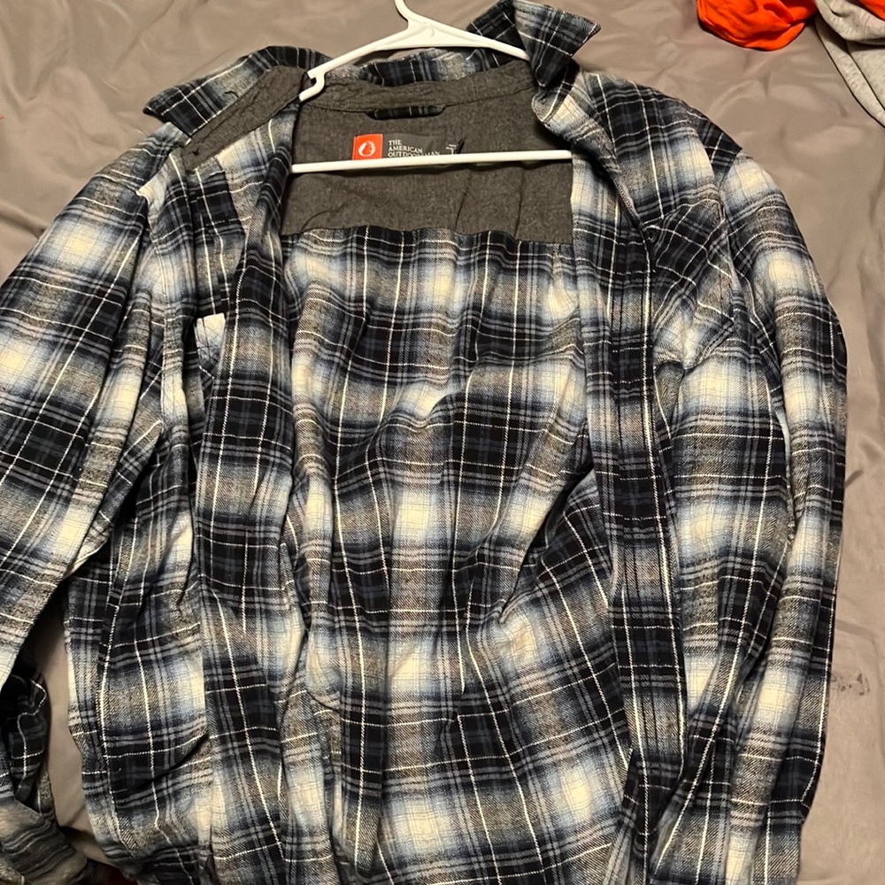 Large blue and black flannel. Doesn’t fit me anymore